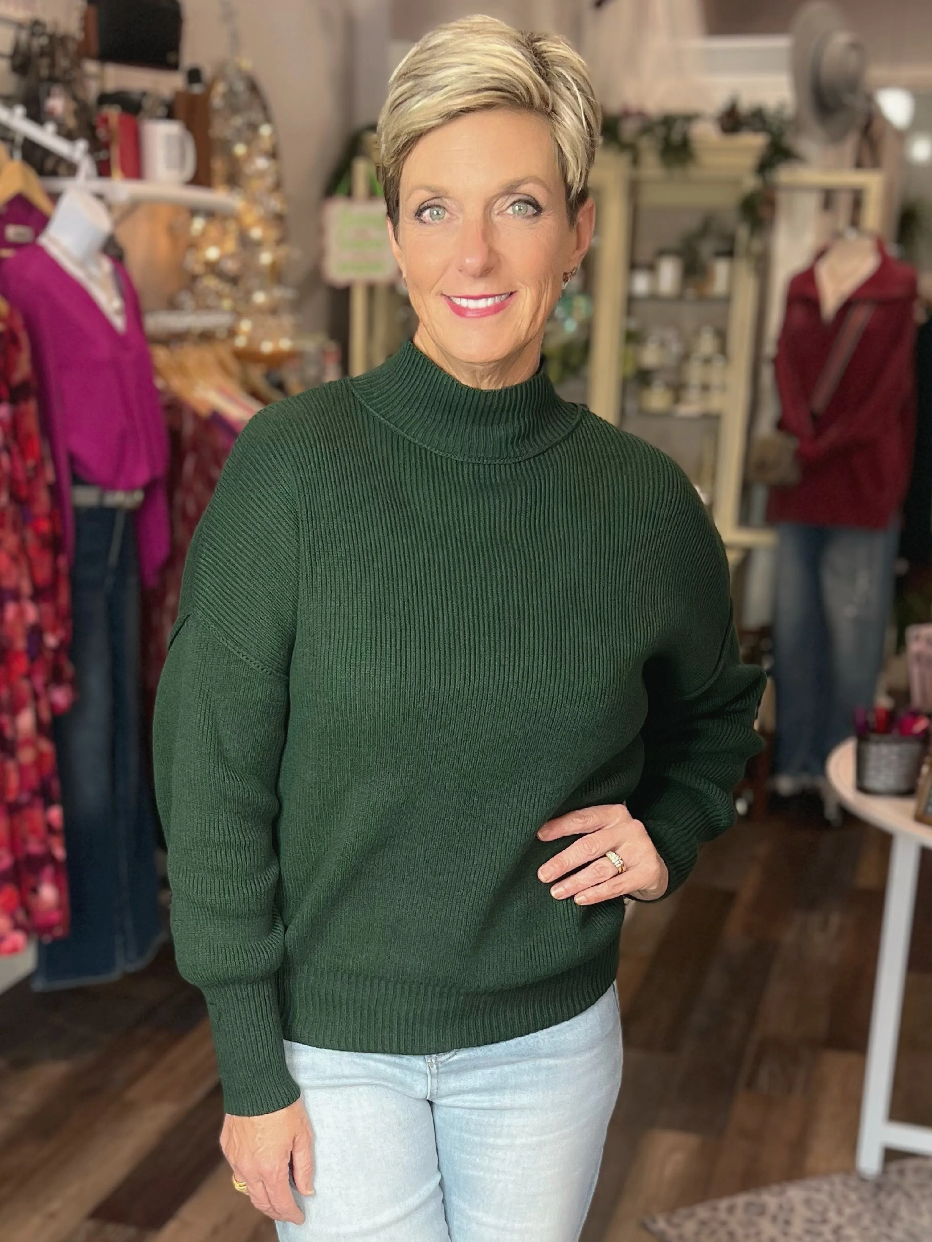 Mock Neck Exposed Seam Sweater in Hunter Green